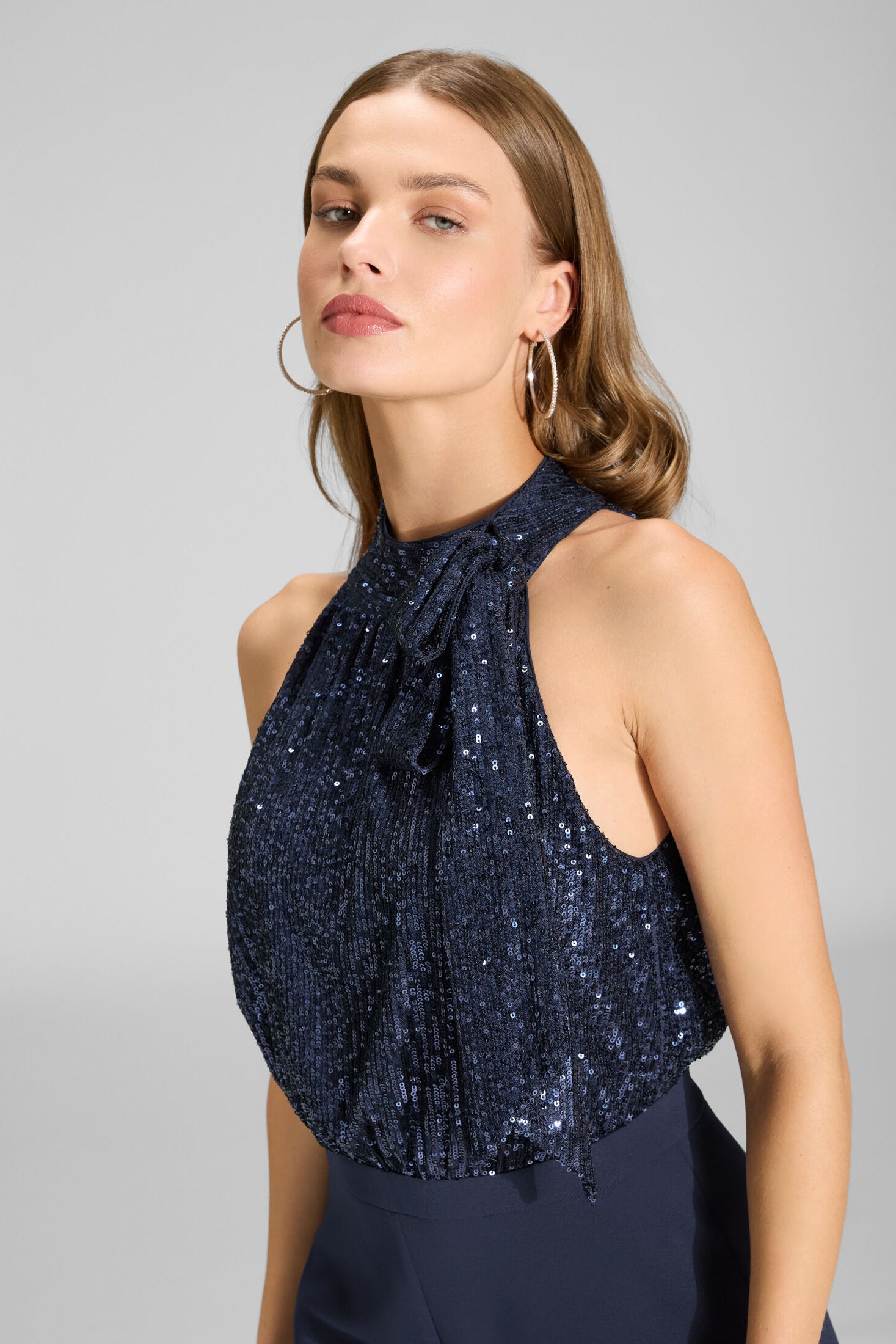 Ärmelloser Jumpsuit mit Schluppenblusen Top aus elastischer Paillette