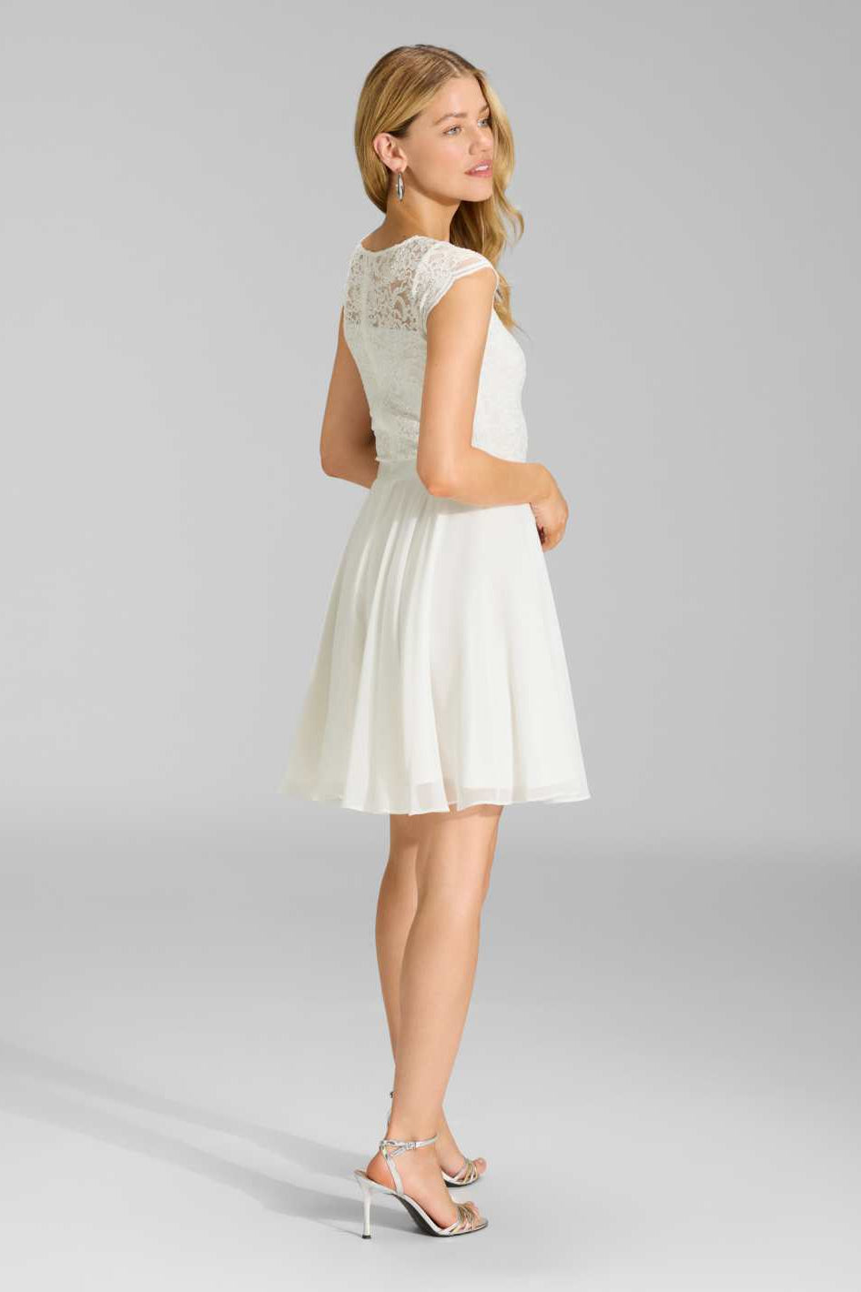 Kleid mit paillettenbesetztem Spitzenoberteil