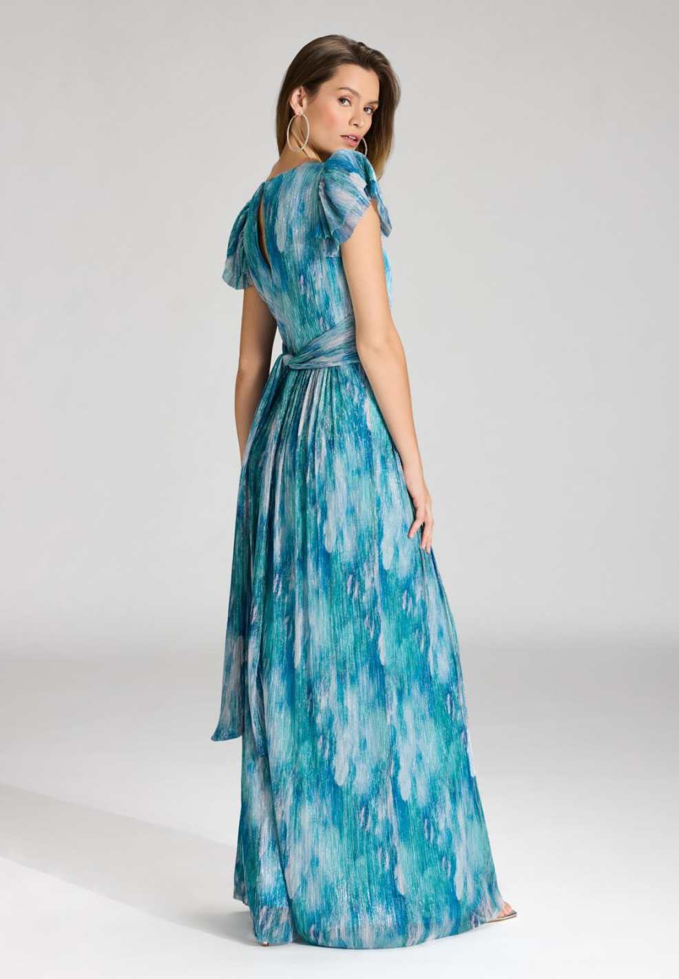 Abendkleid aus bedrucktem Plissee Jersey mit betonter Schulter