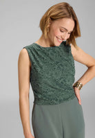 Jumpsuit aus Material-Mix mit Drapierung