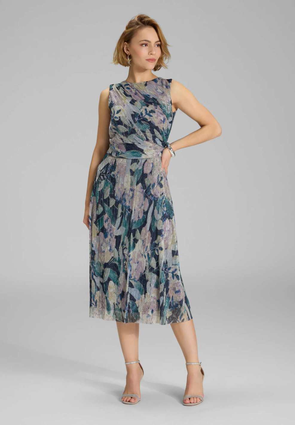 Midi Kleid mit diagonaler Drapierung aus bedrucktem Plissee Jersey