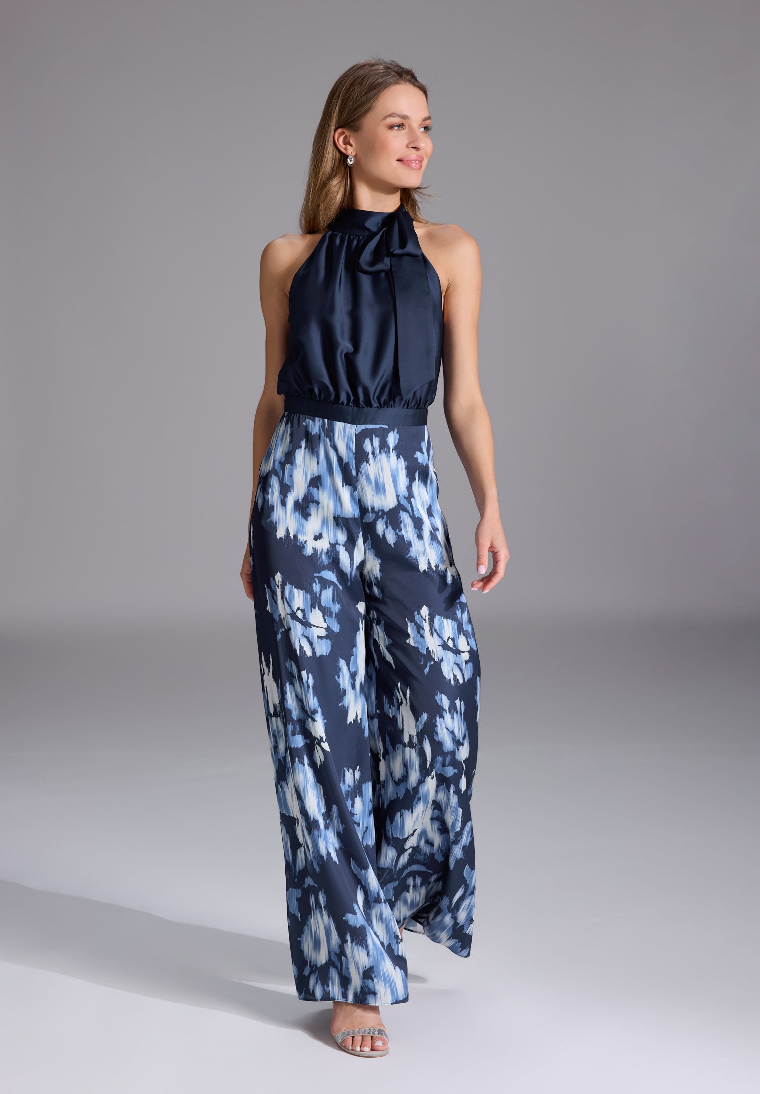Jumpsuit mit Schluppenblusen Top und Druck Hose