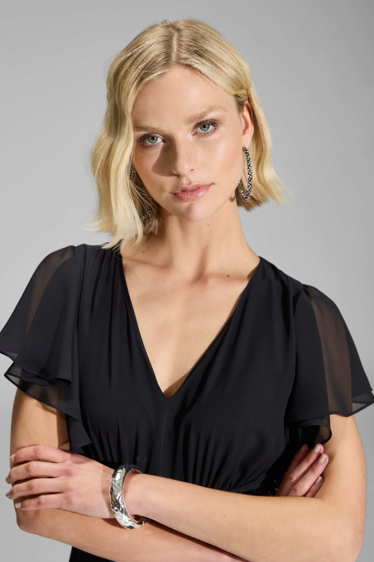 Chiffon Jumpsuit mit Überrock und Volantärmeln