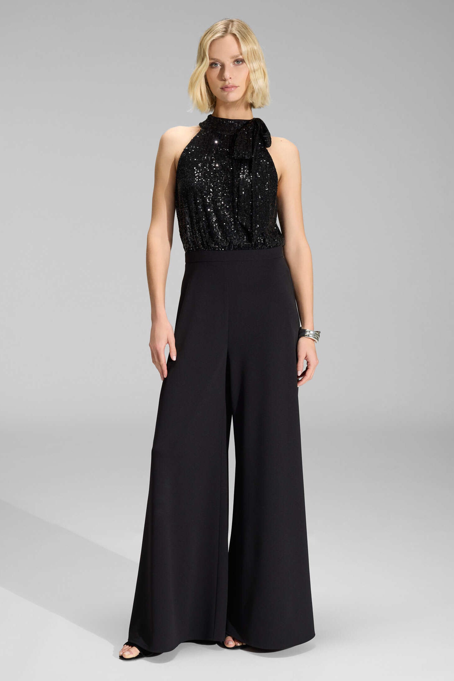 Ärmelloser Jumpsuit mit Schluppenblusen Top aus elastischer Paillette black