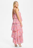 Abendkleid aus bedrucktem Chiffon mit gestuften Volants und Stoffblüte