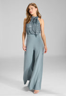 Ärmelloser Jumpsuit mit Schluppenblusen Top aus elastischer Paillette