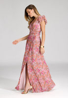 Abendkleid aus bedrucktem Plissee Jersey mit betonter Schulter