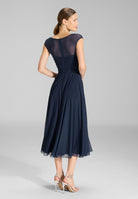 Cocktailkleid aus Mesh mit geraffter Korsage